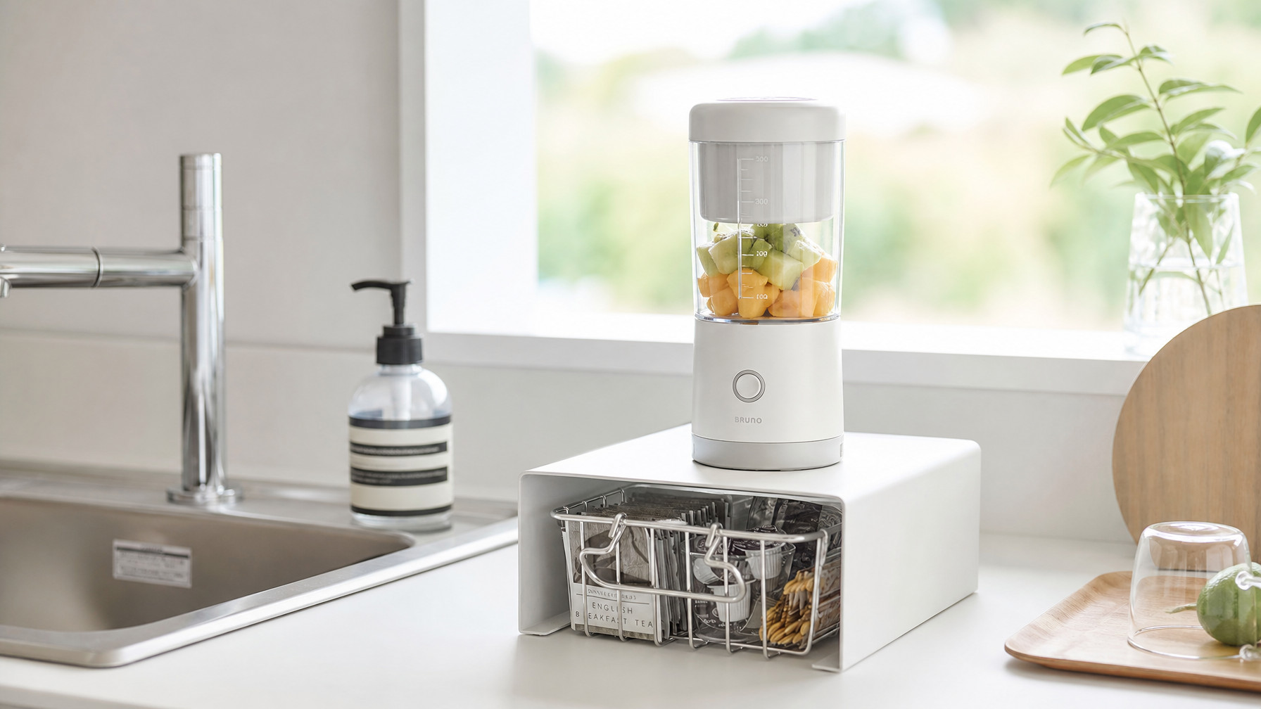 Stackable steel countertop shelf used for organized kitchen storage