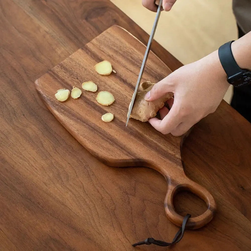 Walnut cutting board 2-piece set &ndash; with loop handle for hanging Zorenza